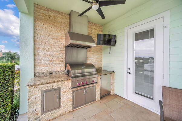 Your very own summer kitchen, complete with an outdoor TV