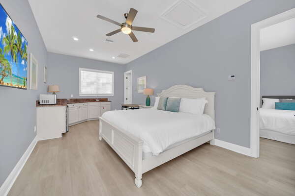 Head upstairs from the annex games room to this large bedroom with a King sized bed