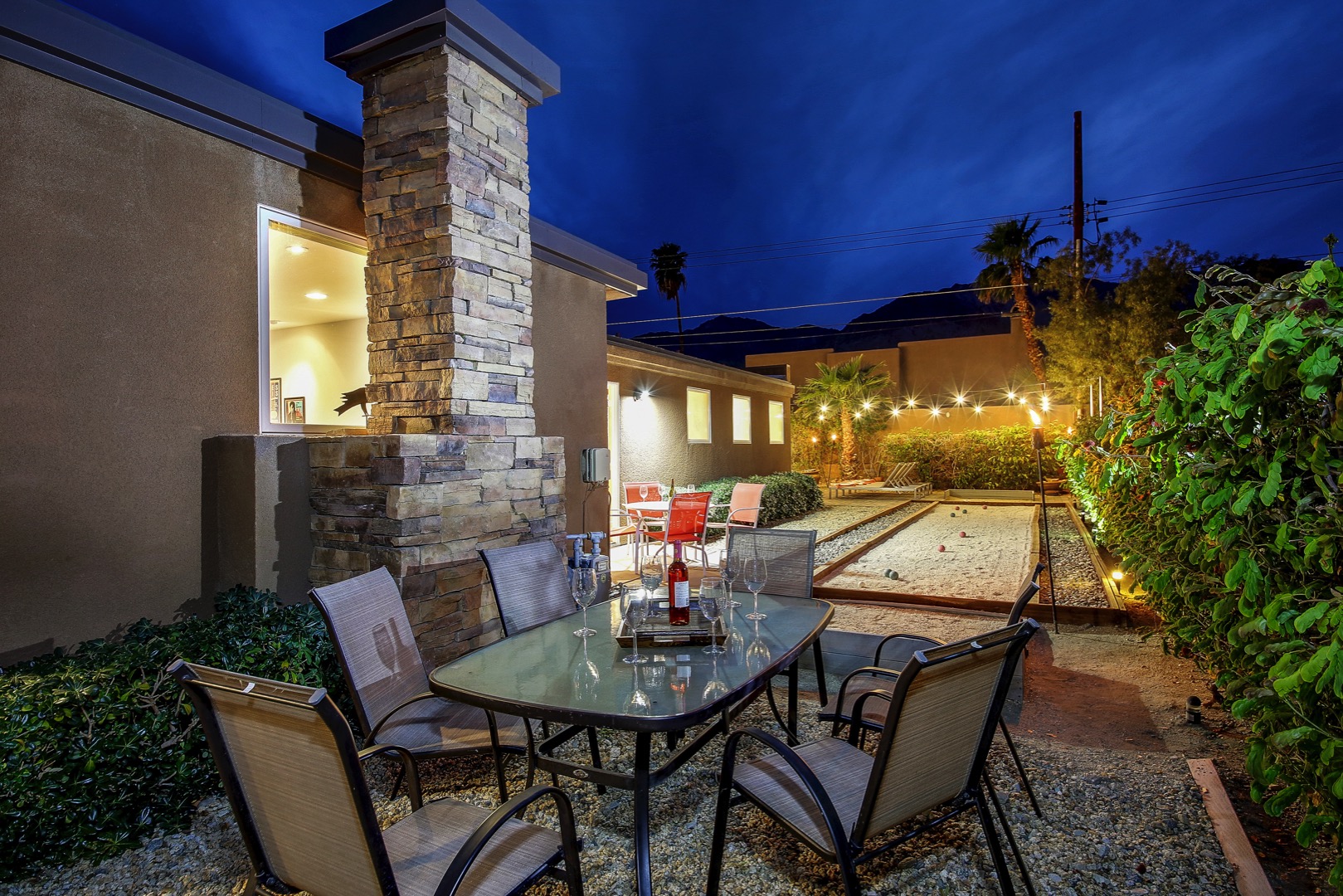 Conveniently located near the Bocce ball court, another patio dinning table for 6.