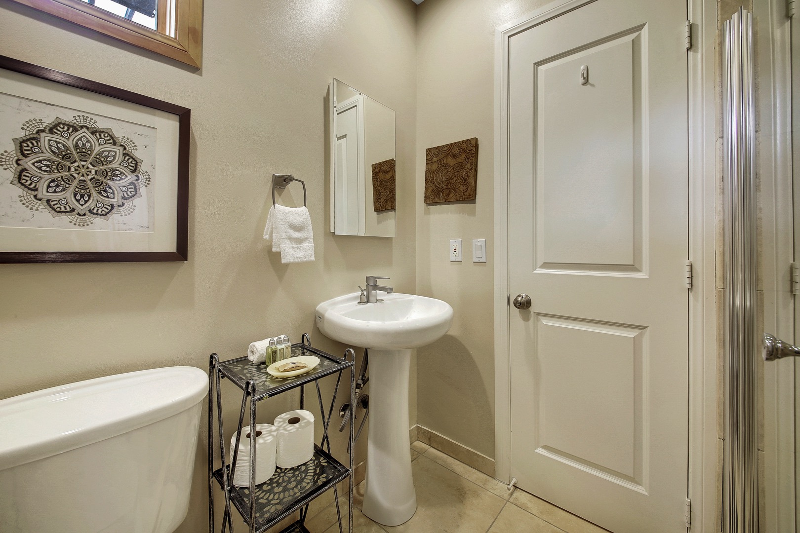 Suite 3 bath with large, tiled shower.