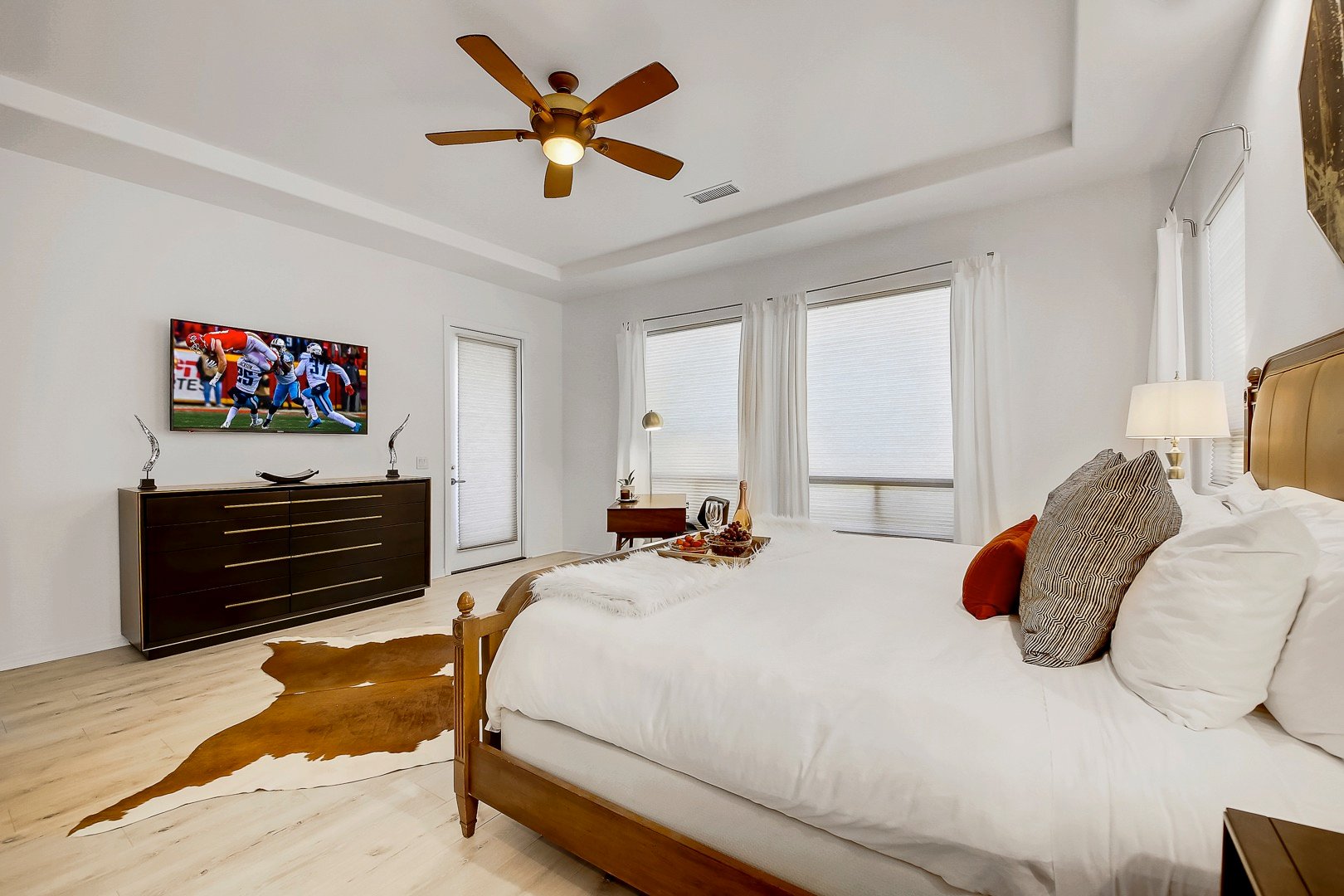 Sleep in and watch the game on the huge TV Master Suite has access to the backyard.