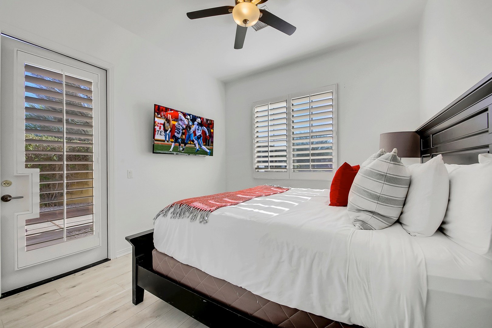 Suite 3 is Located next to the garage and features a Cal King-sized Bed, HD television, switch-controlled ceiling fan, and reach-in closet with access to the front courtyard.
