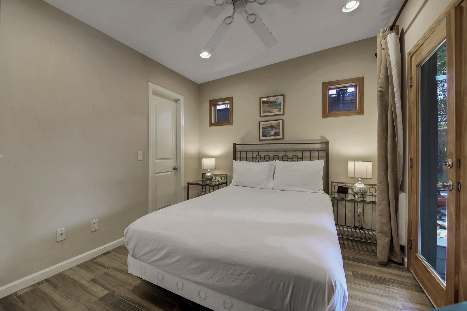 Suite 3 features a Full-sized bed, Smart TV and has exterior doors to the ping pong patio as well as access to the dinning room,