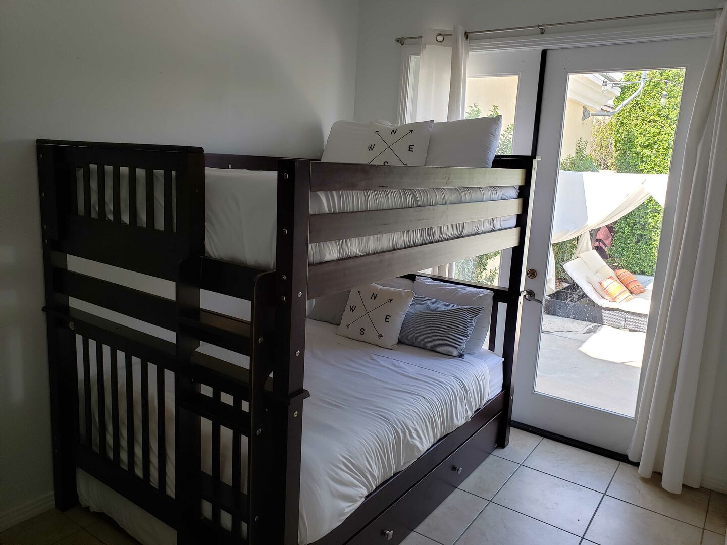 Bedroom 6 is located next to the kitchen and features a Full Over Full with Full Trundle Bunk Bed and a HD television.