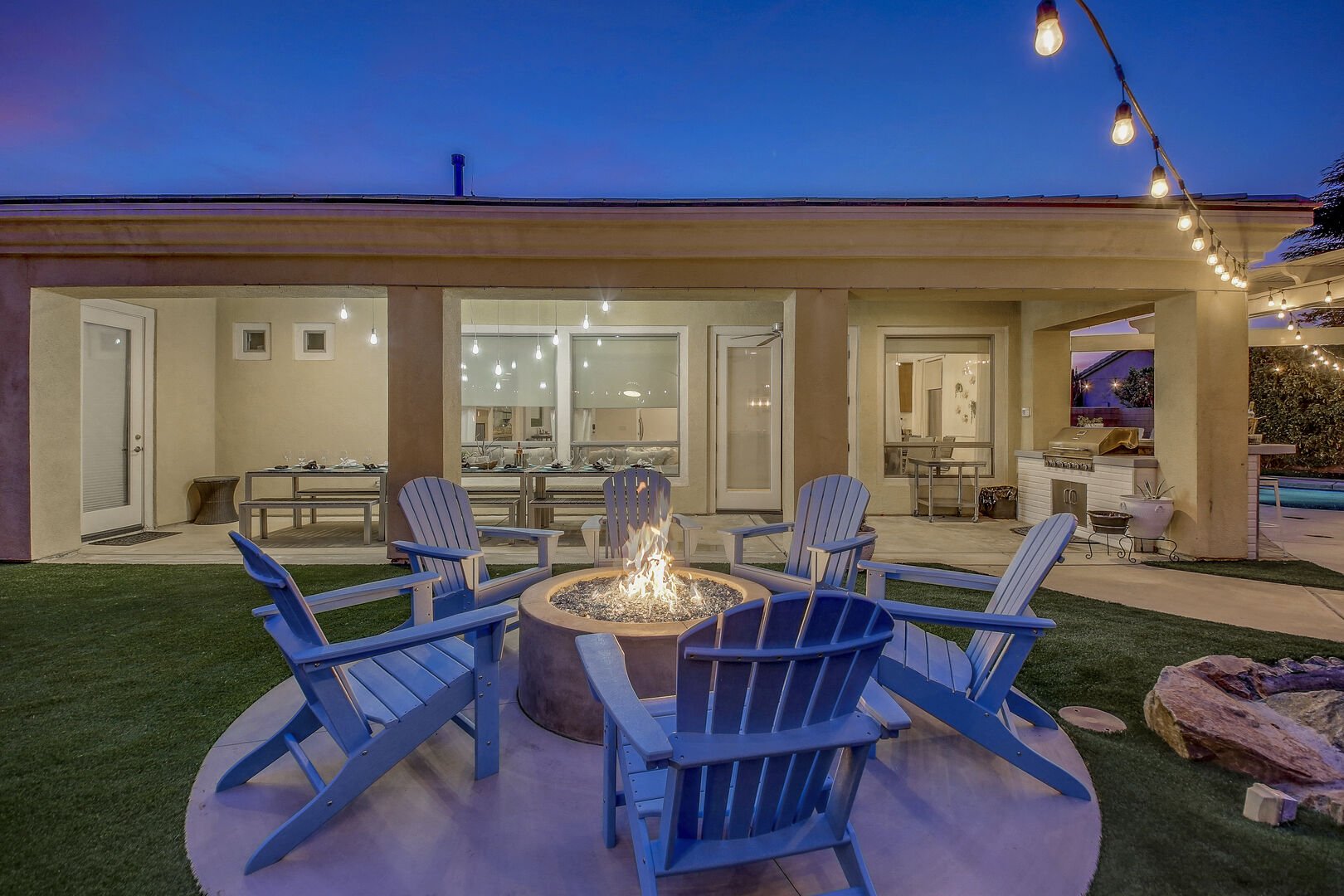 Enjoy a glass of wine by the fire pit!