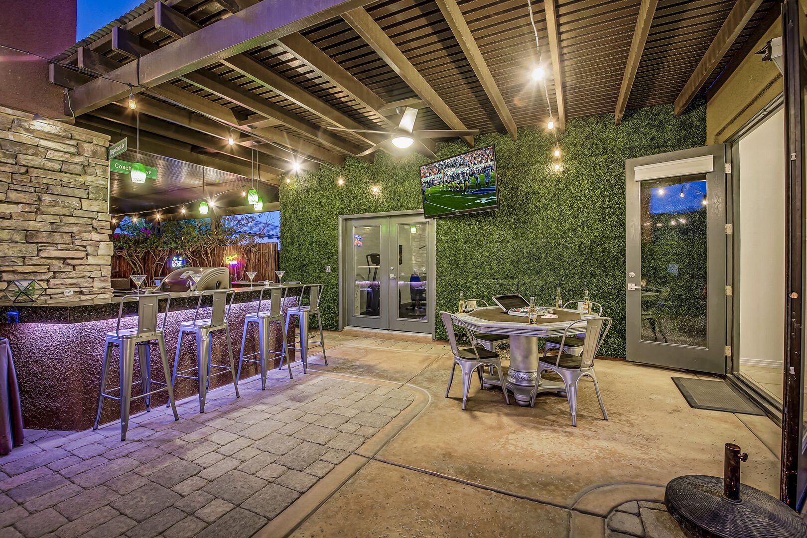 Hang out near the custom built in bar, watch a game on the outdoor TV or play a little game of poker, there is so much to do under the covered patio.