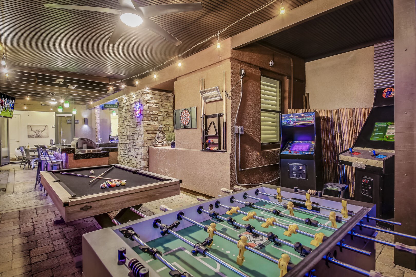 The game area is perfect for kids and adults! Enjoy a game of Pool or table foosball, or simply enjoy your beer on the bar-height table with seating for two.