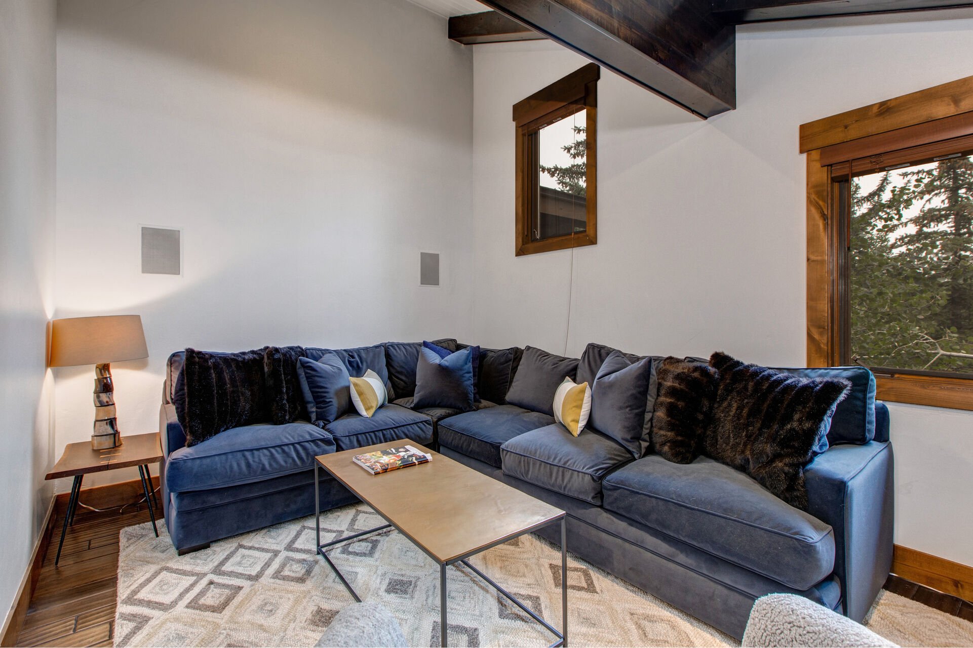 Upper Level Loft with a Comfortable Sectional Sofa and Smart TV