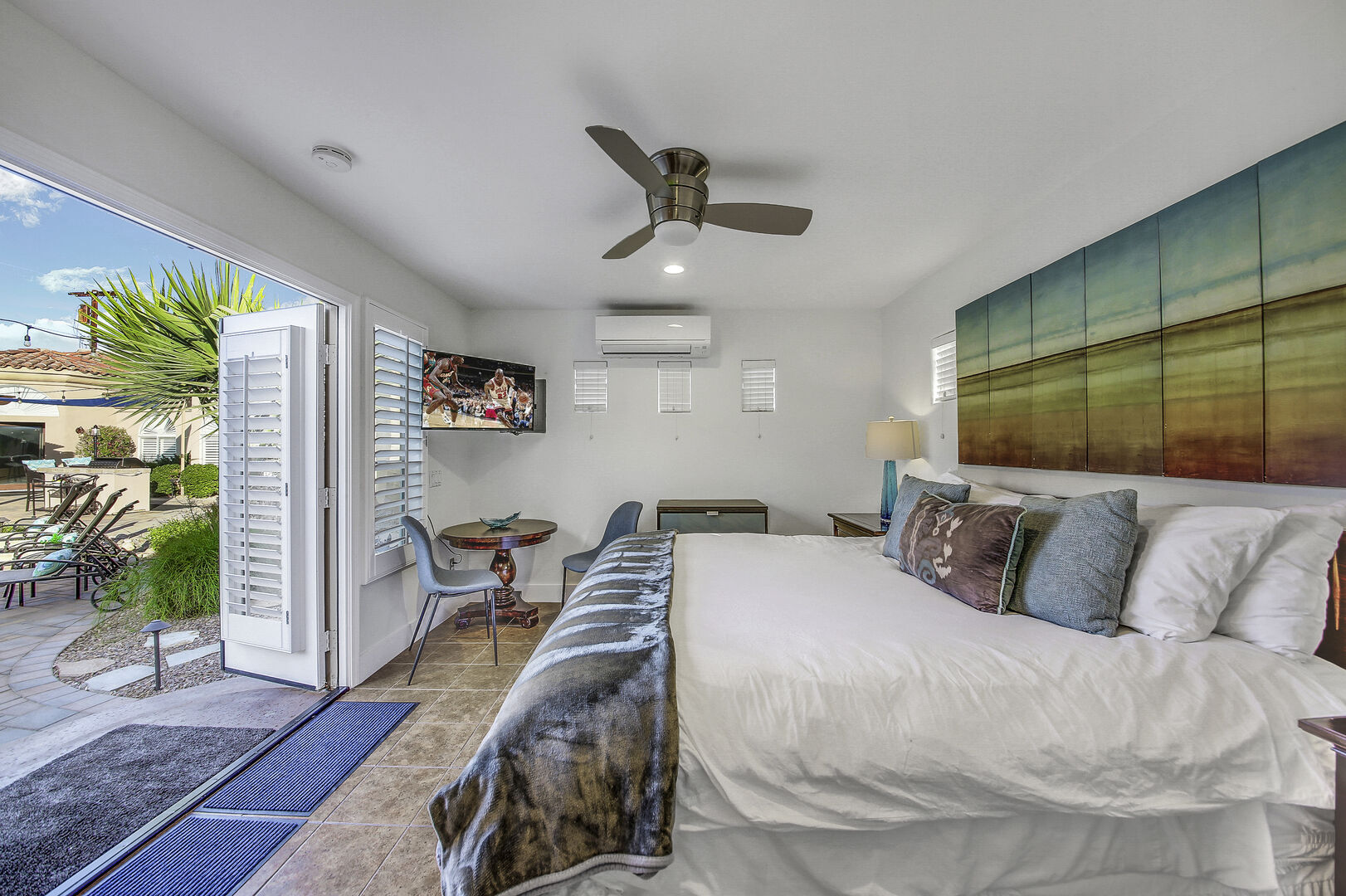 The detached Casita Suite 2 is located to the left of the courtyard gate and features a King-sized Bed.