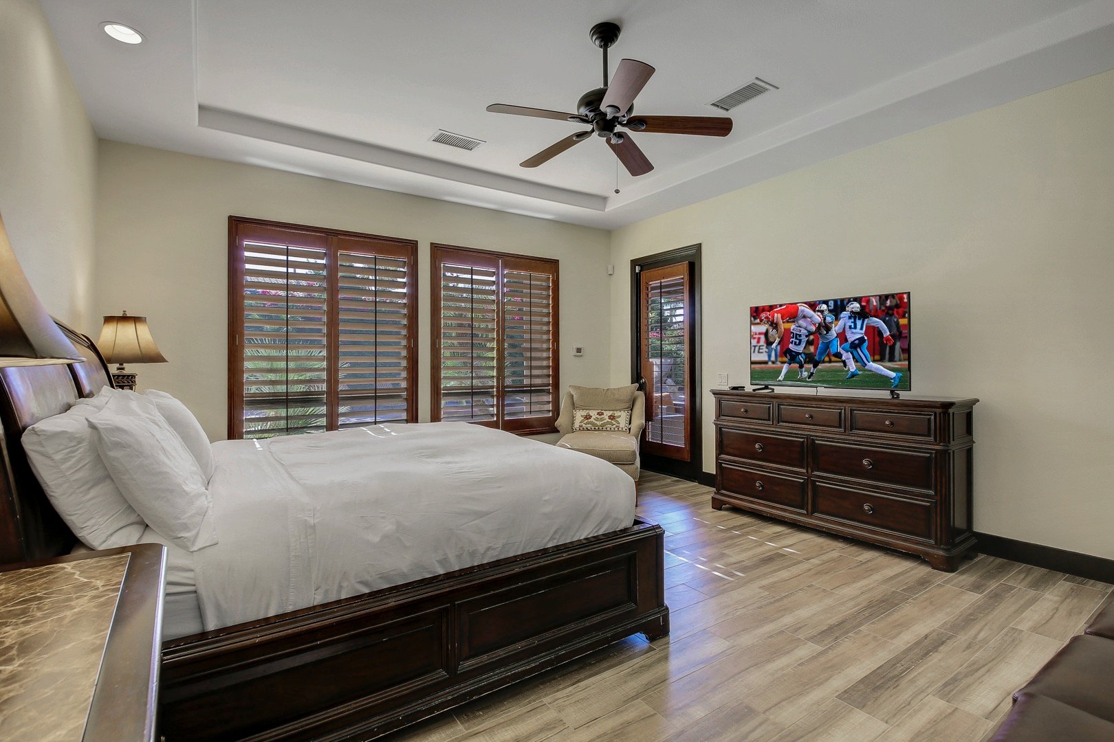 The master bedroom has its own separate access to backyard pool area!