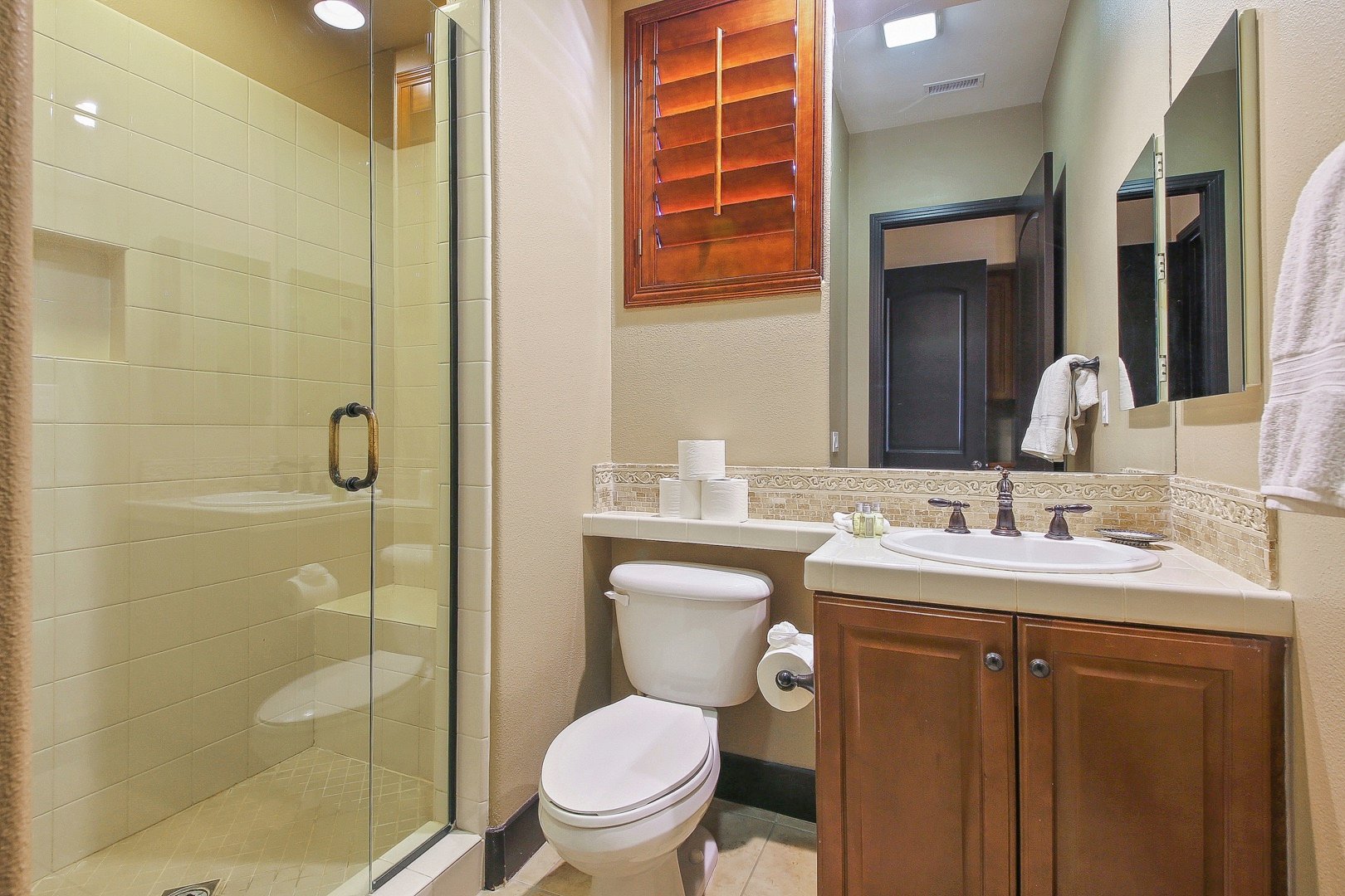 ​​​​​​​Bathroom 4 is located in front of bedroom 5 and features a tile shower and vanity sink. It may be used to service bedrooms 5 and 6.