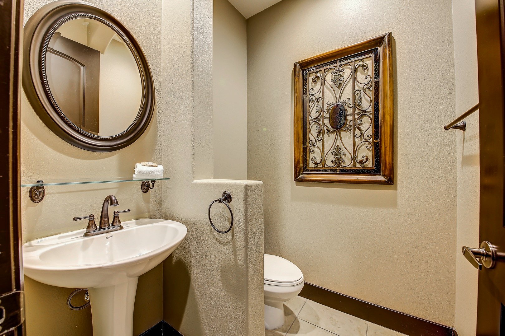Powder room 5 is located at the hallway and features a pedestal sink.