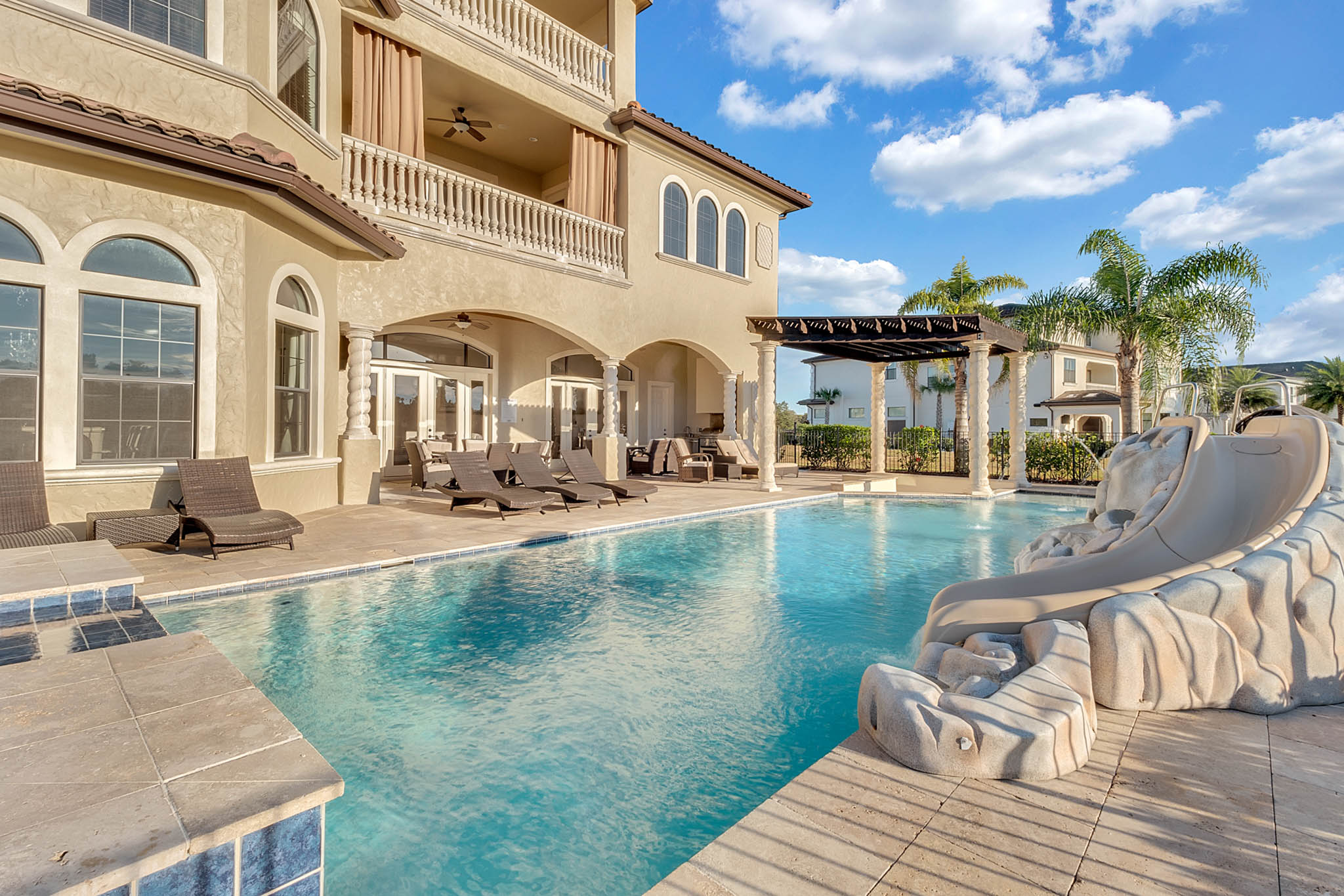 This luxurious 12-bedroom villa features incredible amenities for your next Orlando vacation