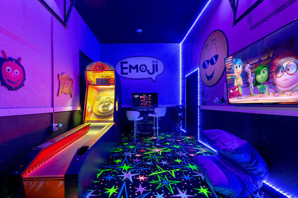 Off the movie theatre room there is a games room in the next room, Welcome to Emoji land