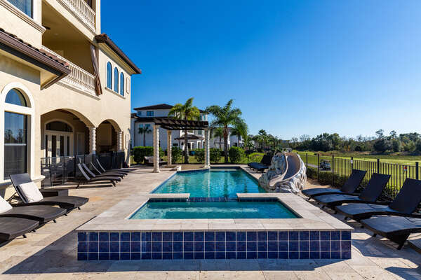 This beautiful custom pool with spillover spa overlooks the Jack Nicklaus Signature Golf Course