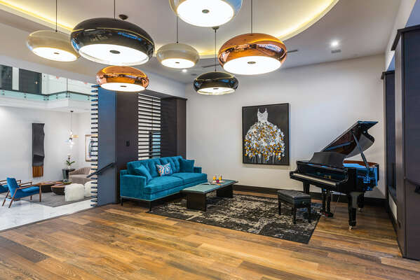 Take in the melodies of a beautiful grand piano in this salon