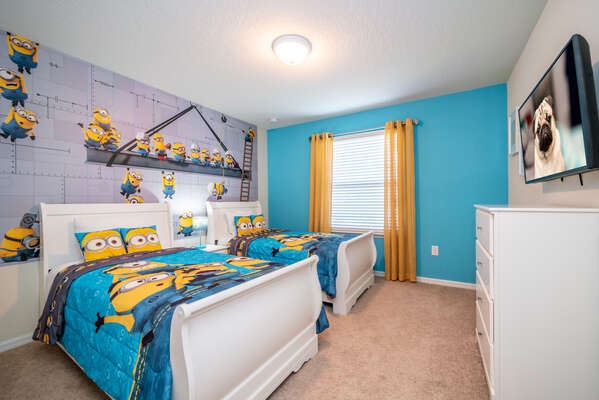 Themed Kid's Suite showing 2-twin beds and TV