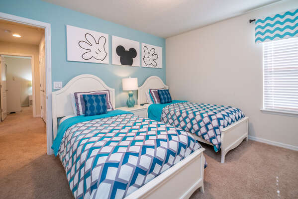 Themed Kid's Suite showing 2-twin beds and TV
