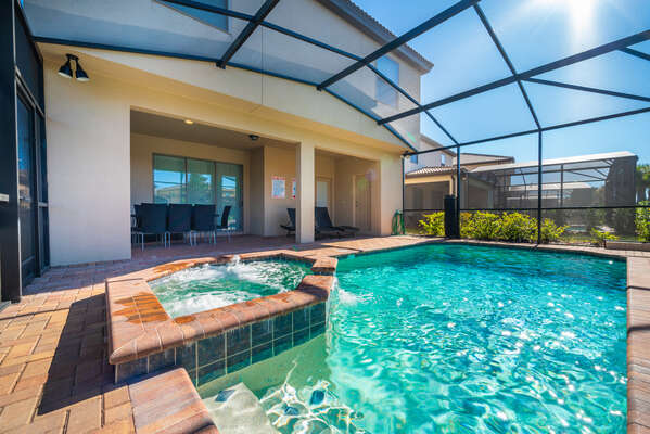 Pool and spa view showing covered lanai