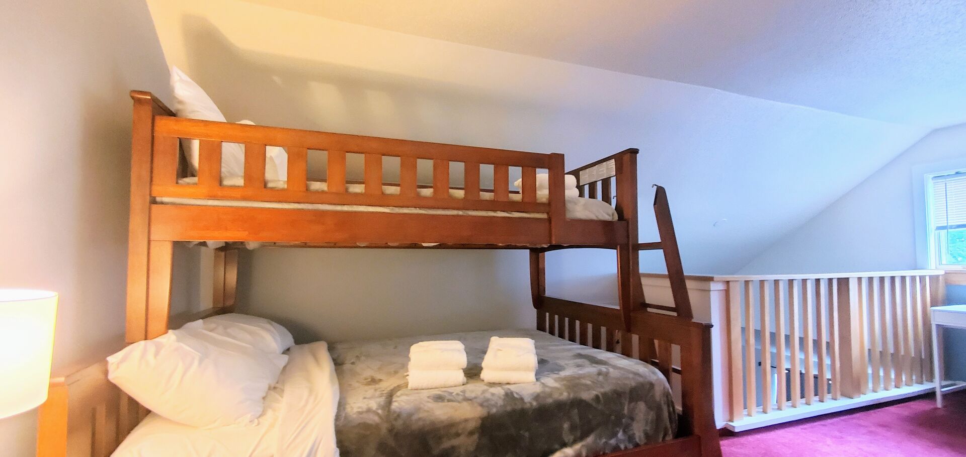 Loft with twin over queen bunk bed.