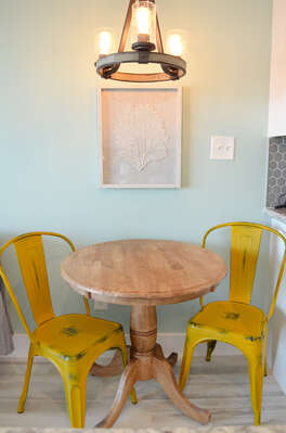 Enjoy a nice home-cooked meal or an easy ordered in meal at this cute dining table!