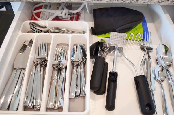Fully stocked kitchen with nice silverware and kitchen tools - every detail for our guests!!