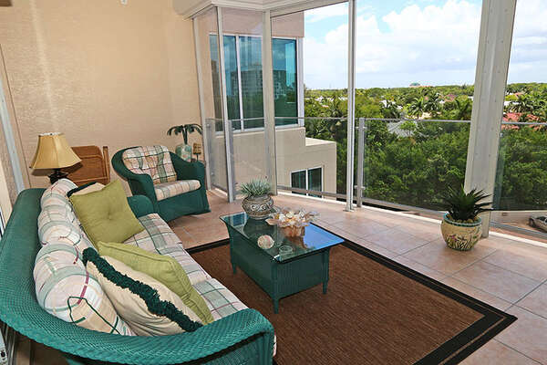 Guest bedrooms enjoy a separate screened balcony with backwater views