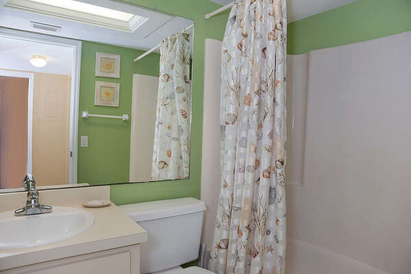 Guest bathroom  offers privacy.