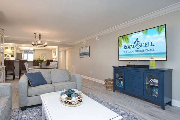 Living area with wall-mounted SmartTV