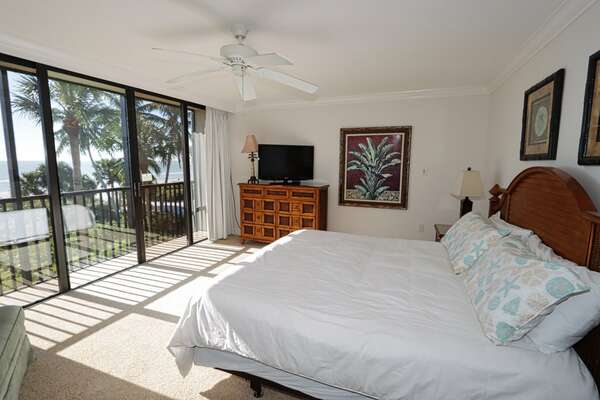 Master bedroom with king bed and gulf front view