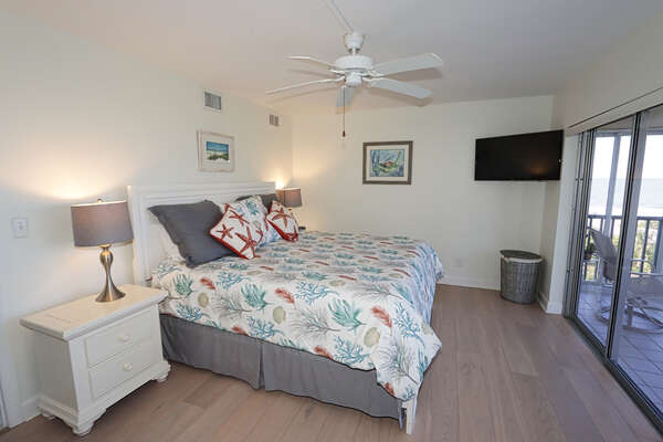 Master Bedroom with King Bed, en-suite bathroom and lanai access.