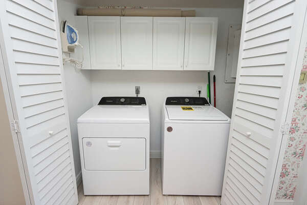 Laundry closet with washer and dryer