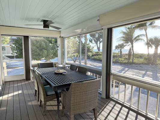Lanai with outdoor dining table
