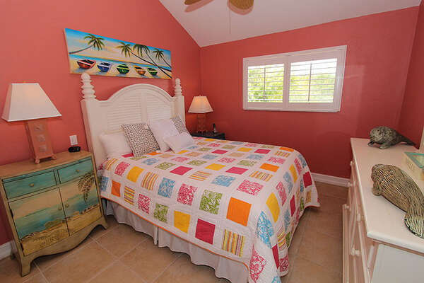 Guest bedroom also colorful and fun.