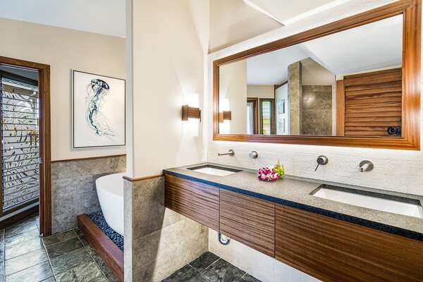 Bathroom with Double Sinks, Soaking Tub, and Walk-in Shower