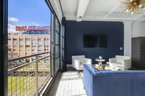 This Ponce Rental has a living area with view of the Ponce City Market