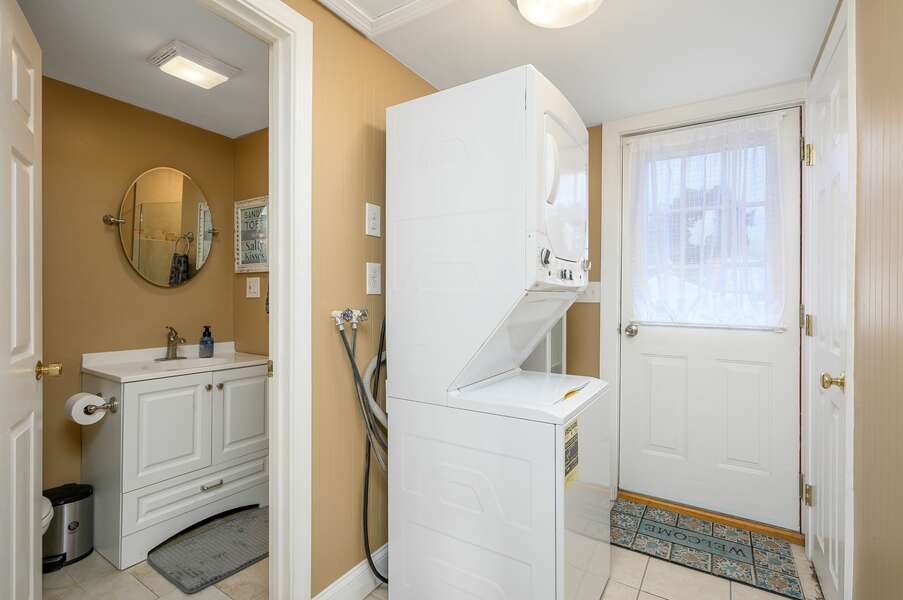 Laundry and adjacent bathroom (one) with shower off of dining room and near true front door - 128 Sea Street Unit 11 Dennisport Cape Cod New England Vacation Rentals