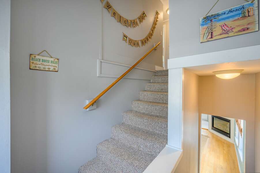 Encounter whimsical decor on your way upstairs - 128 Sea Street Unit 11 Dennisport Cape Cod New England Vacation Rentals