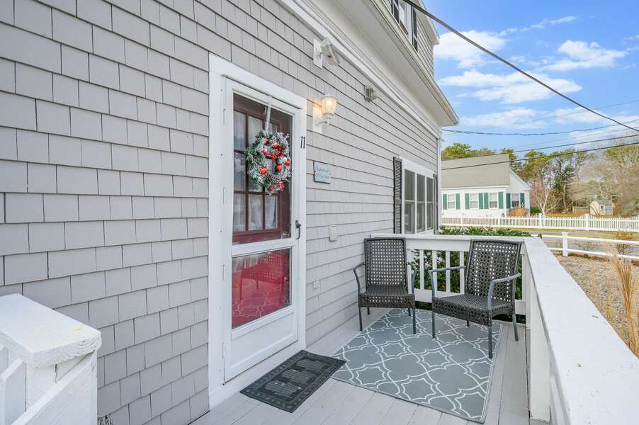 Official but seldom used front door off of shared parking - 128 Sea Street Unit 11 Dennisport Cape Cod New England Vacation Rentals