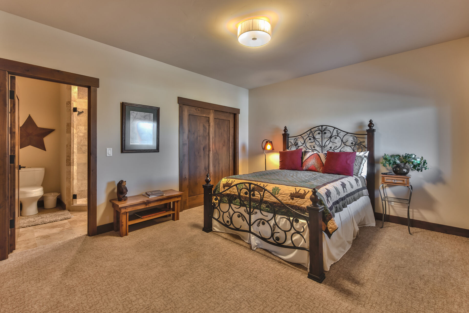 1st Level Master Bedroom 3 with a Queen Bed, a Private Bath and Mountain Views