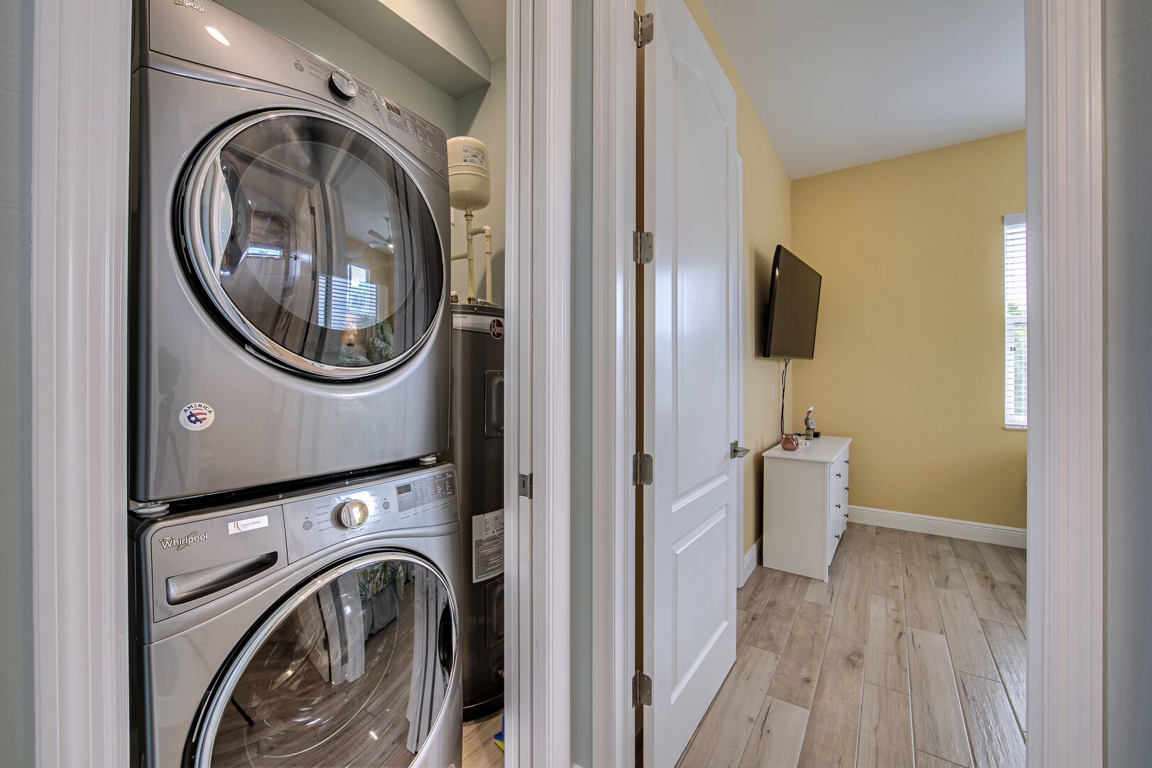 Laundry Room with stacked washer/dryer