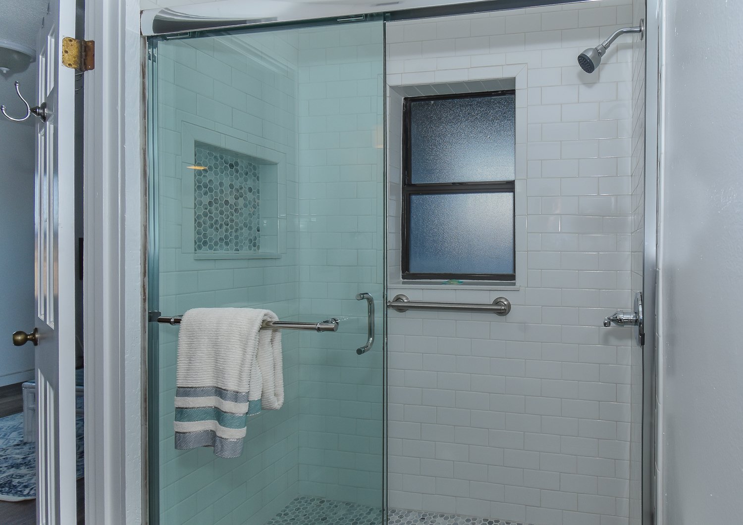 Walk-in shower with sliding door
