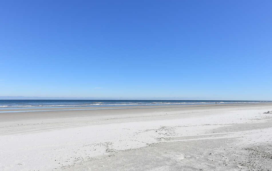 sandy beach with blue sky