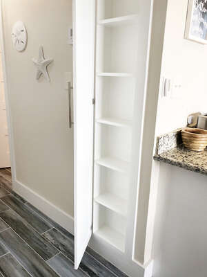 Custom built in small pantry- perfect for snacks! Just another 