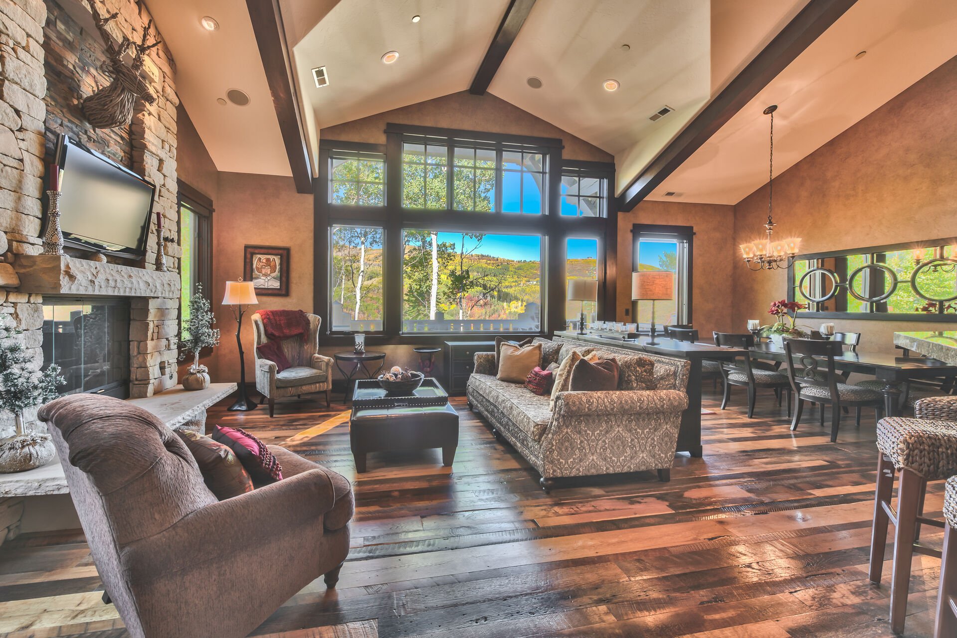 Living Room, Gourmet Kitchen and Dining Area - All with Beautiful Hardwood Floors and Ski  Resort Views