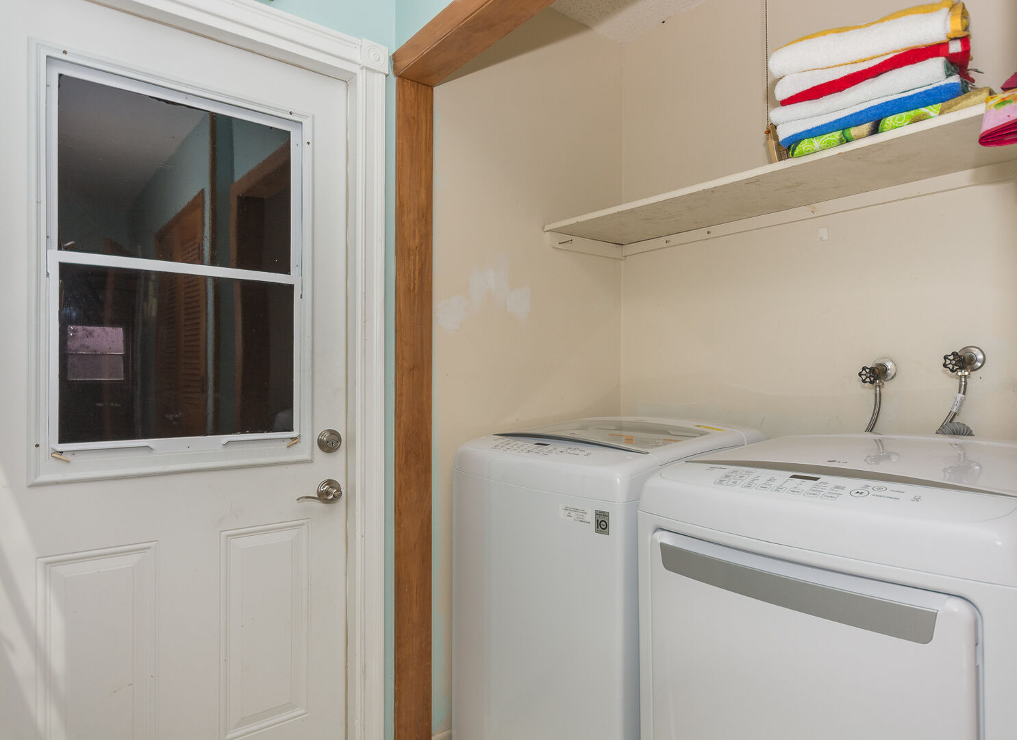 Full sized washer and dryer. and access to the garage.