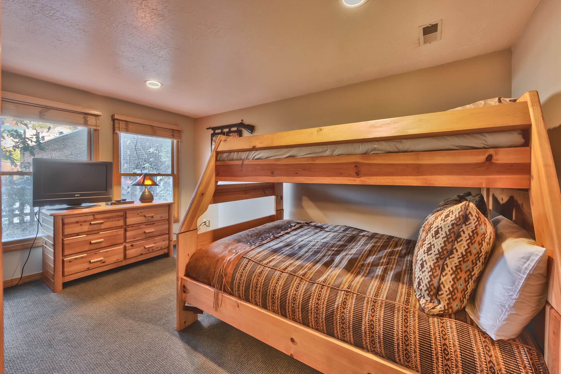 Bunk Room Level 1 with a Twin over Full Bunk Bed, TV and Private Bath