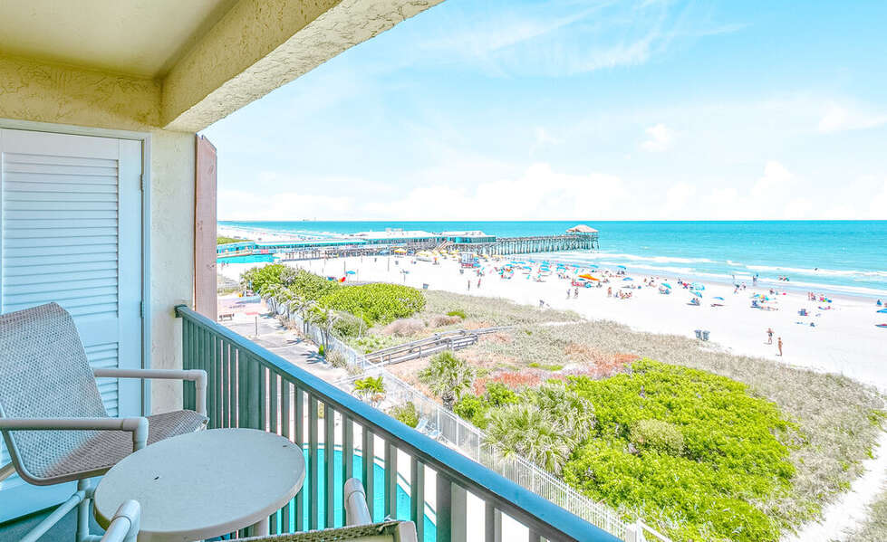 Private balcony overlooking the beach a perfect spot for morning coffee