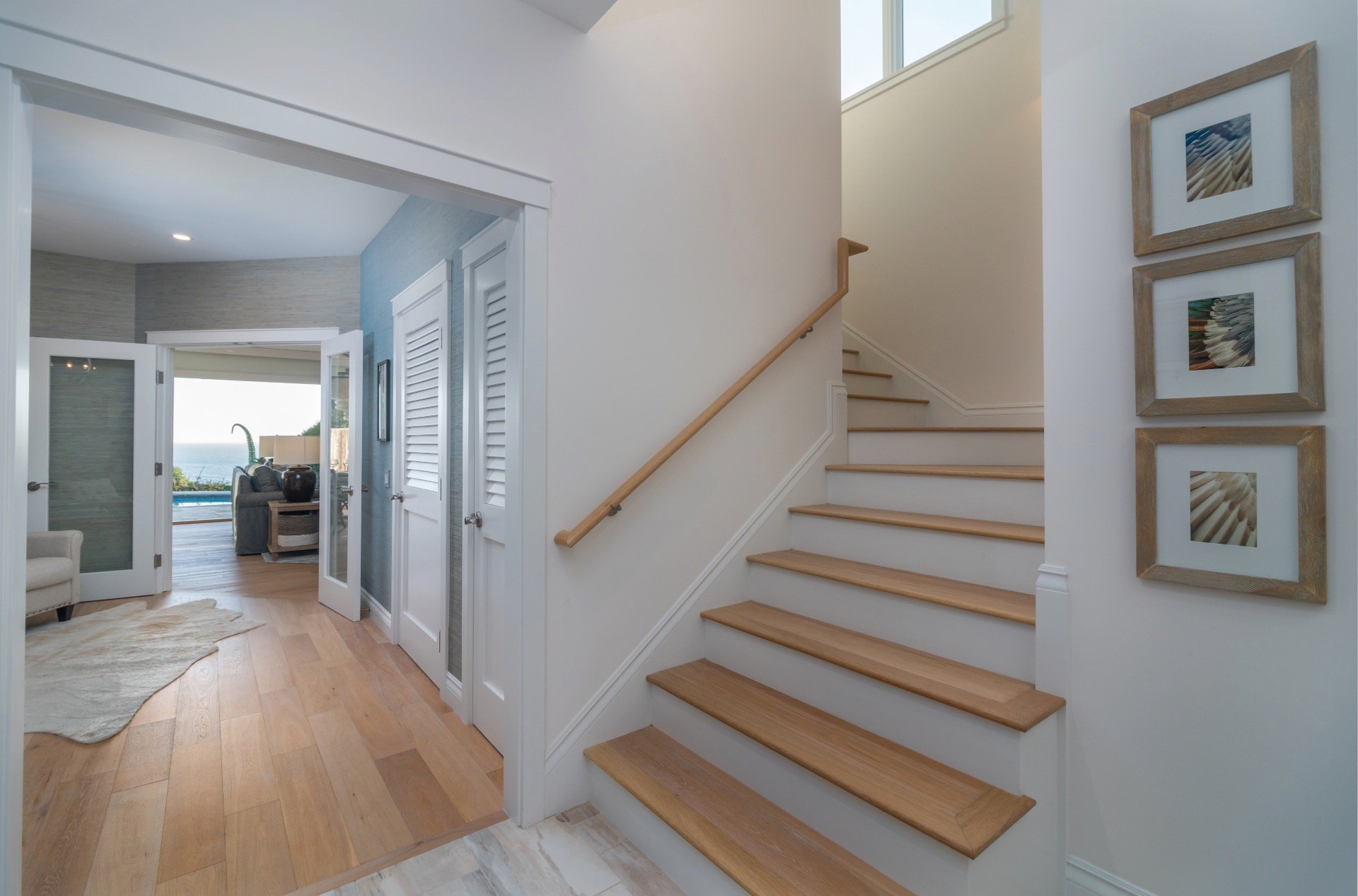 Stairway leading up to the master bedroom and one guest bedroom.