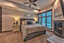 Master Bedroom with a King Bed, a Gas Fireplace, Smart TV and Private Bath